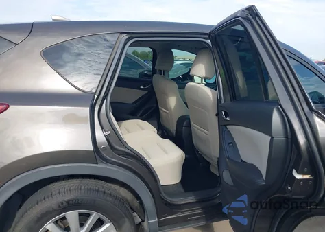 2016 Mazda Cx-5 Touring z USA, uszkodzony, nr VIN JM3KE2CY6G0900829